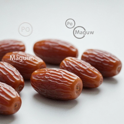 Close-up of fresh dates with visual representations of potassium and magnesium symbols